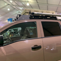 Nissan Titan truck with Avatar Offroad roof rack installed, showcasing durable custom roof rack for cargo storage.