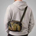 Recycled Firefighter TrailHound Fanny Pack in Cordura fabric, black with adjustable strap and multiple storage compartments.