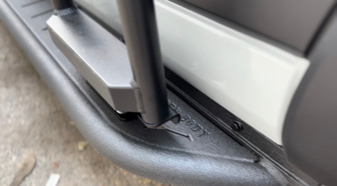 Avatar Offroad Ford Transit Rockbody side steps installed on van, durable step bars with textured surface for easy access.