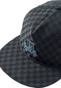 TravisMathew adult Time Arrival golf hat with curved brim, adjustable strap, and TravisMathew logo, in neutral colors.