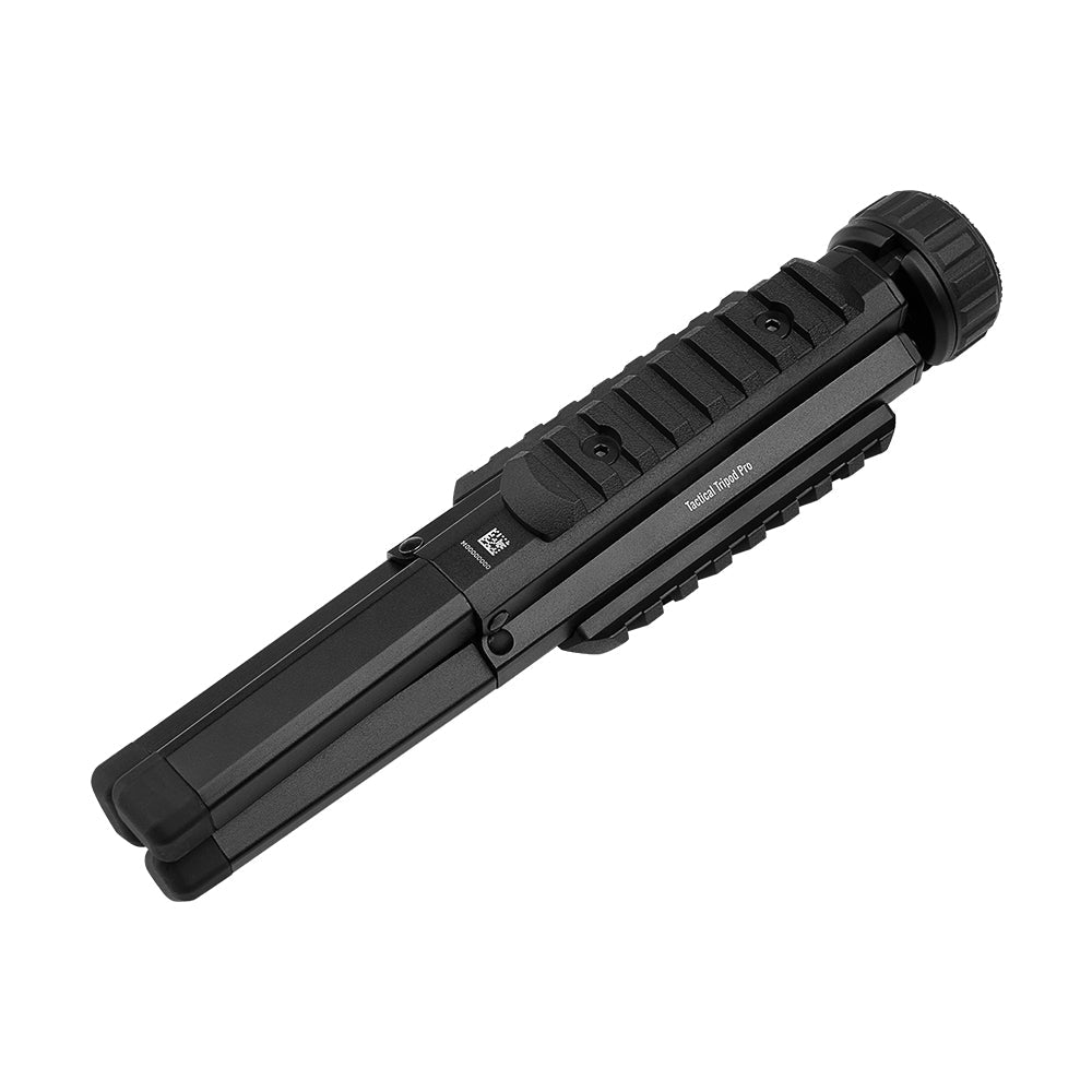 MUCITUP Olight Prowess flashlight mounted on a sturdy tripod for stable outdoor lighting and photography.