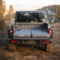 Luno® AIR Truck Bed Mattress fitted in a mid-size truck bed, showcasing its design and comfortable surface.