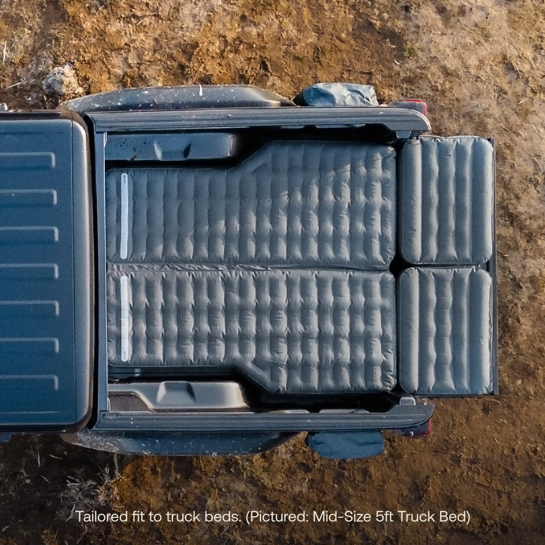 Luno® AIR Truck Bed Mattress fitted in a mid-size truck bed, showcasing its comfortable design and durable material.