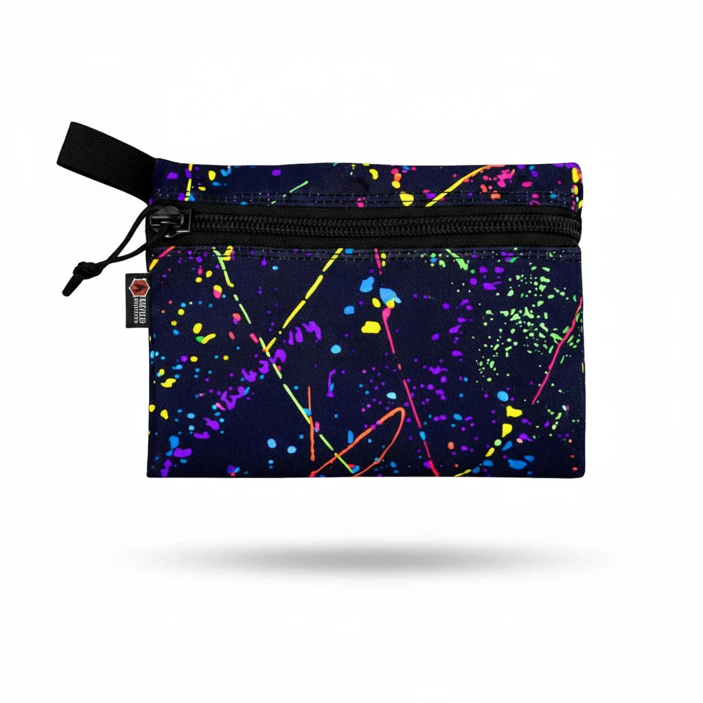 Large Recycled Firefighter Truckie bag made of durable cordura with a colorful splatter design, suitable for outdoor and travel use.