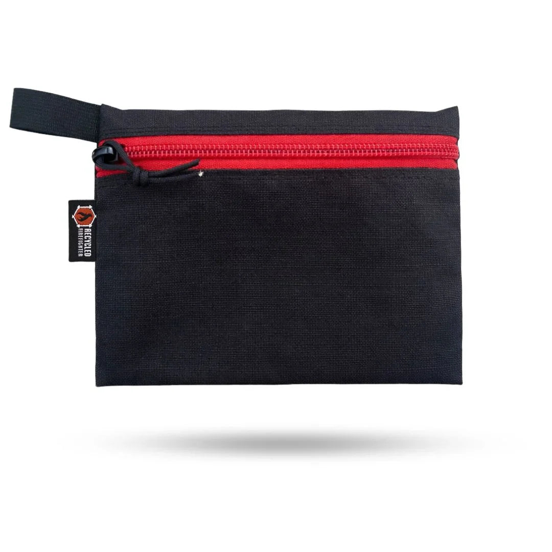 Recycled Firefighter Truckie Large backpack in black and red with sturdy straps and logo, designed for outdoor and daily use.