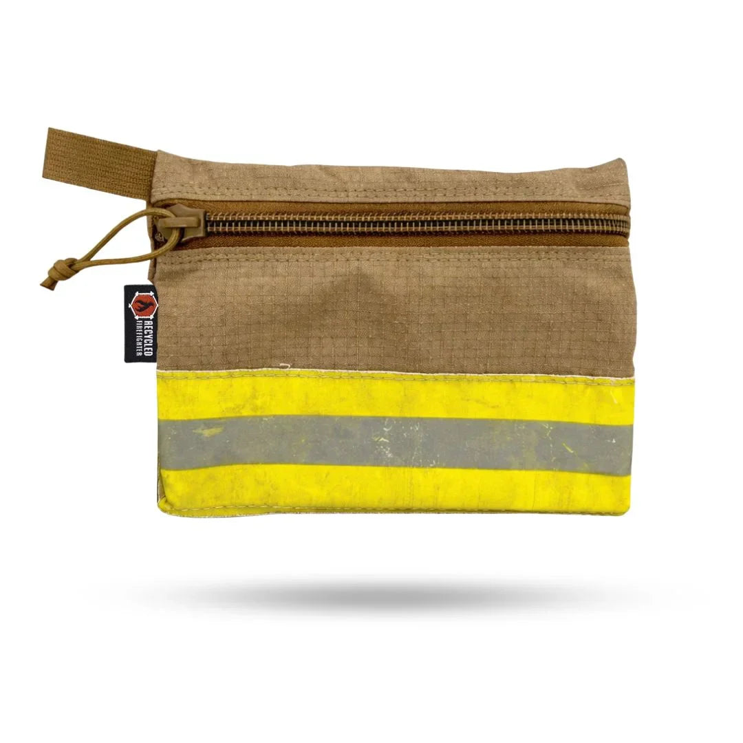 Large Recycled Firefighter Truckie backpack in vintage brown bunker gear, made from recycled firefighter materials.