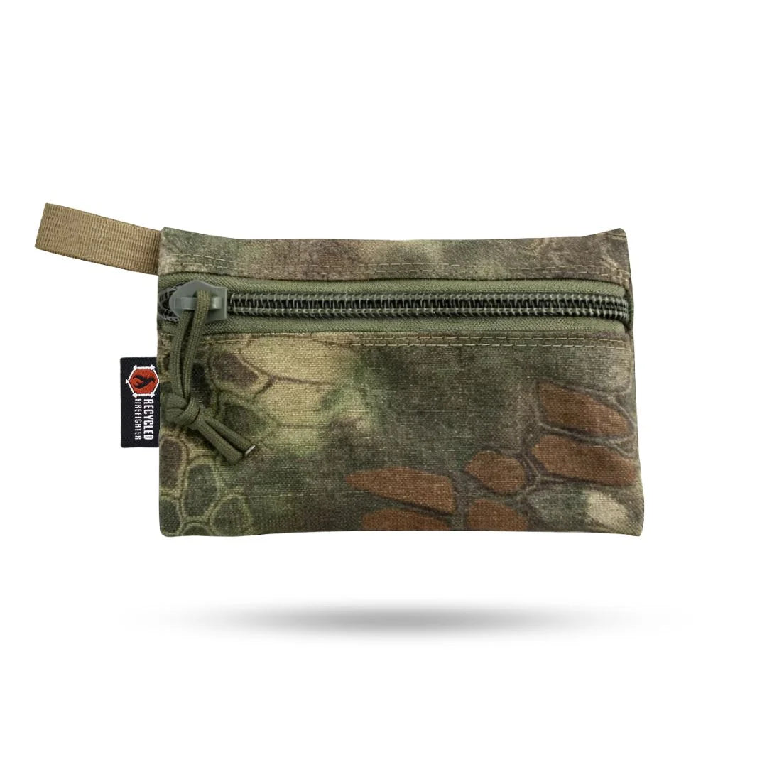 Recycled Firefighter Truckie Medium bag made of durable cordura fabric in Mandrake color, featuring sturdy design and adjustable strap.