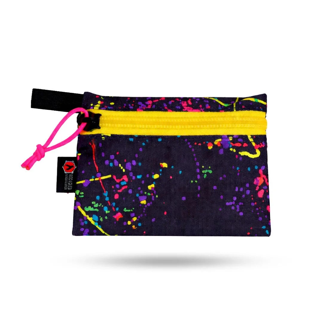 Medium Recycled Firefighter Truckie bag with cordura fabric, yellow zipper, and splatter design, designed for versatile urban use.