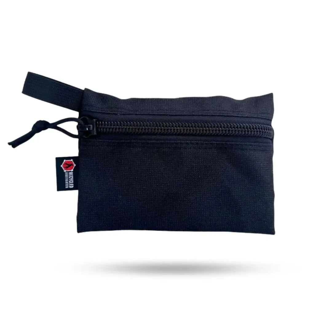 Recycled Firefighter Truckie medium-sized backpack in black with black bungee gear, durable and eco-friendly for outdoor use.