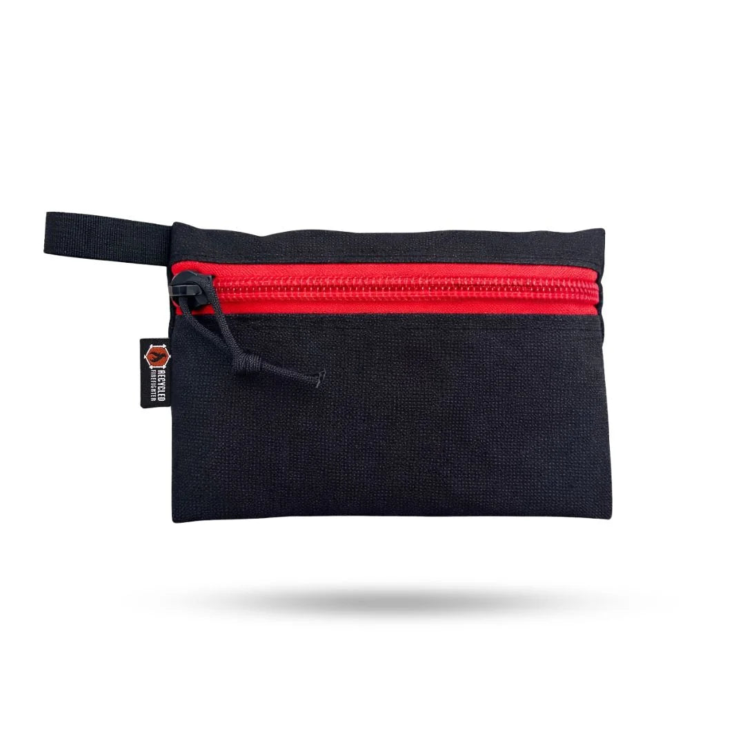 Recycled Firefighter Truckie Medium backpack in black and red with bungee gear and MSA logo, outdoor-ready and durable.