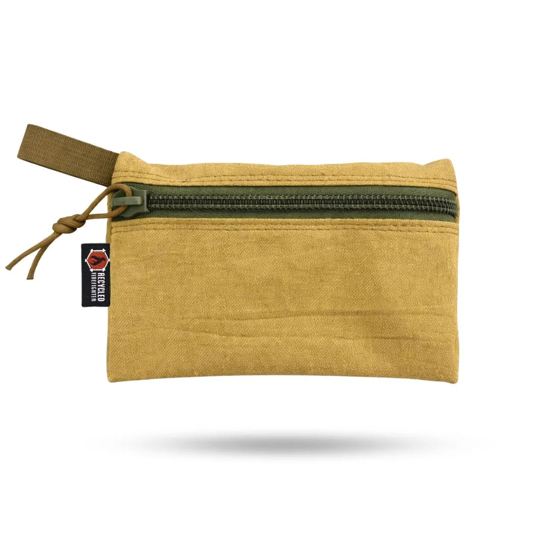 Recycled Firefighter Truckie Medium backpack in brown and olive green with bungee gear and MSA logo details.