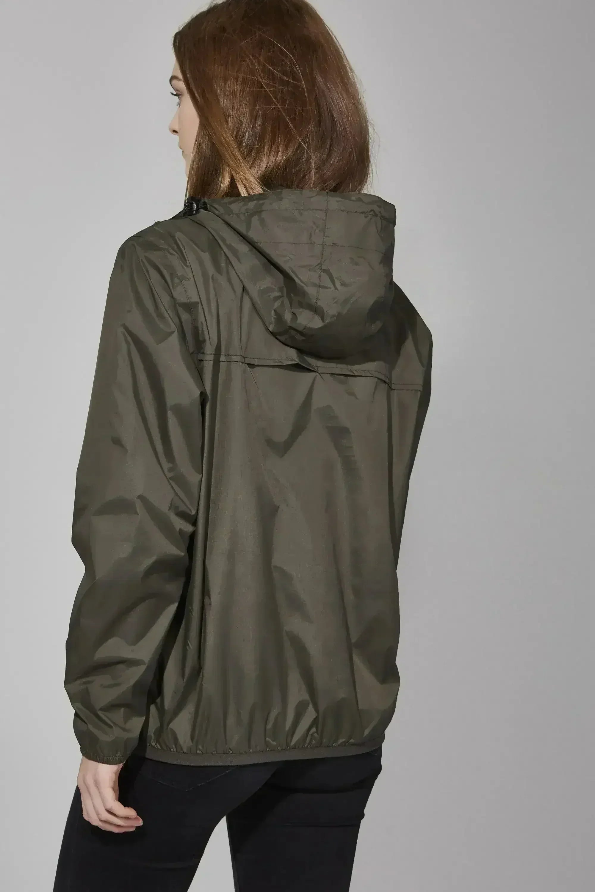 Femstylo Torba quarter zip light packable rain jacket, shown in a compact, lightweight design perfect for rainy weather.