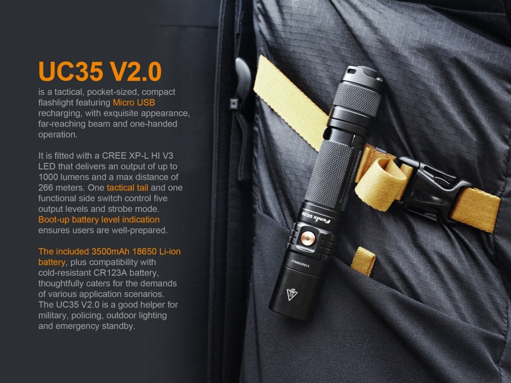 Fenix UC35 V2.0 LED rechargeable flashlight with compact design and bright beam, shown on a textured surface.