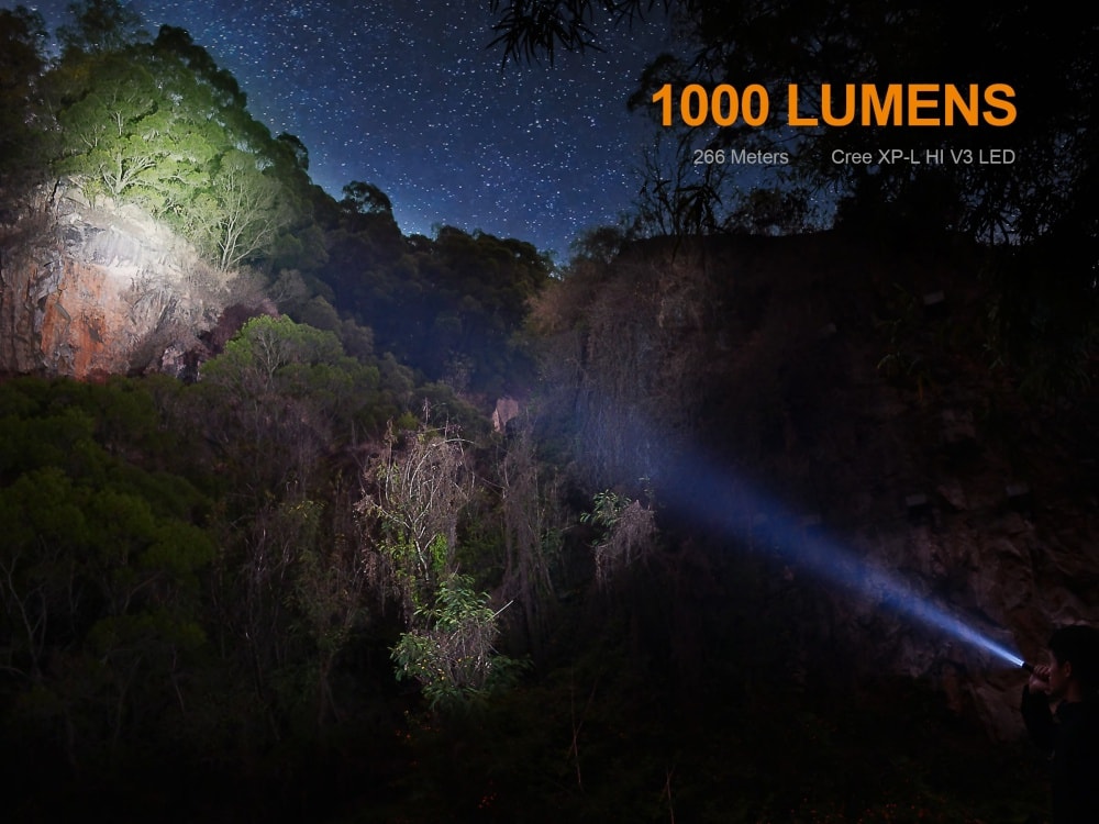 Fenix UC35 V2.0 LED rechargeable EDC flashlight with compact design and bright beam on a dark background.