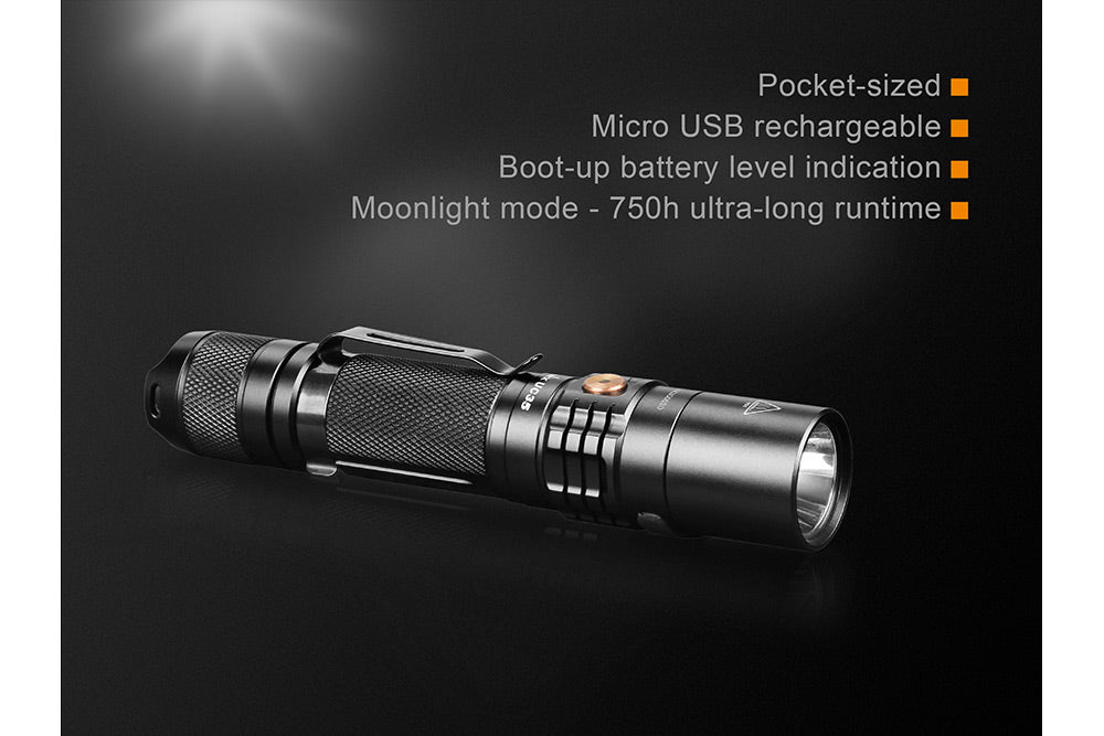 Fenix UC35 V2.0 rechargeable EDC flashlight with compact design and bright LED beam in a dark setting.