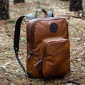 Backcountry Sportsman Bison Leather Standard Backpack in a lifestyle setting, showcasing its rugged design and spacious interior.
