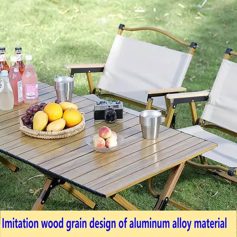 Portable outdoor picnic table from DailySale with foldable wooden top and metal legs, ideal for outdoor recreation activities.