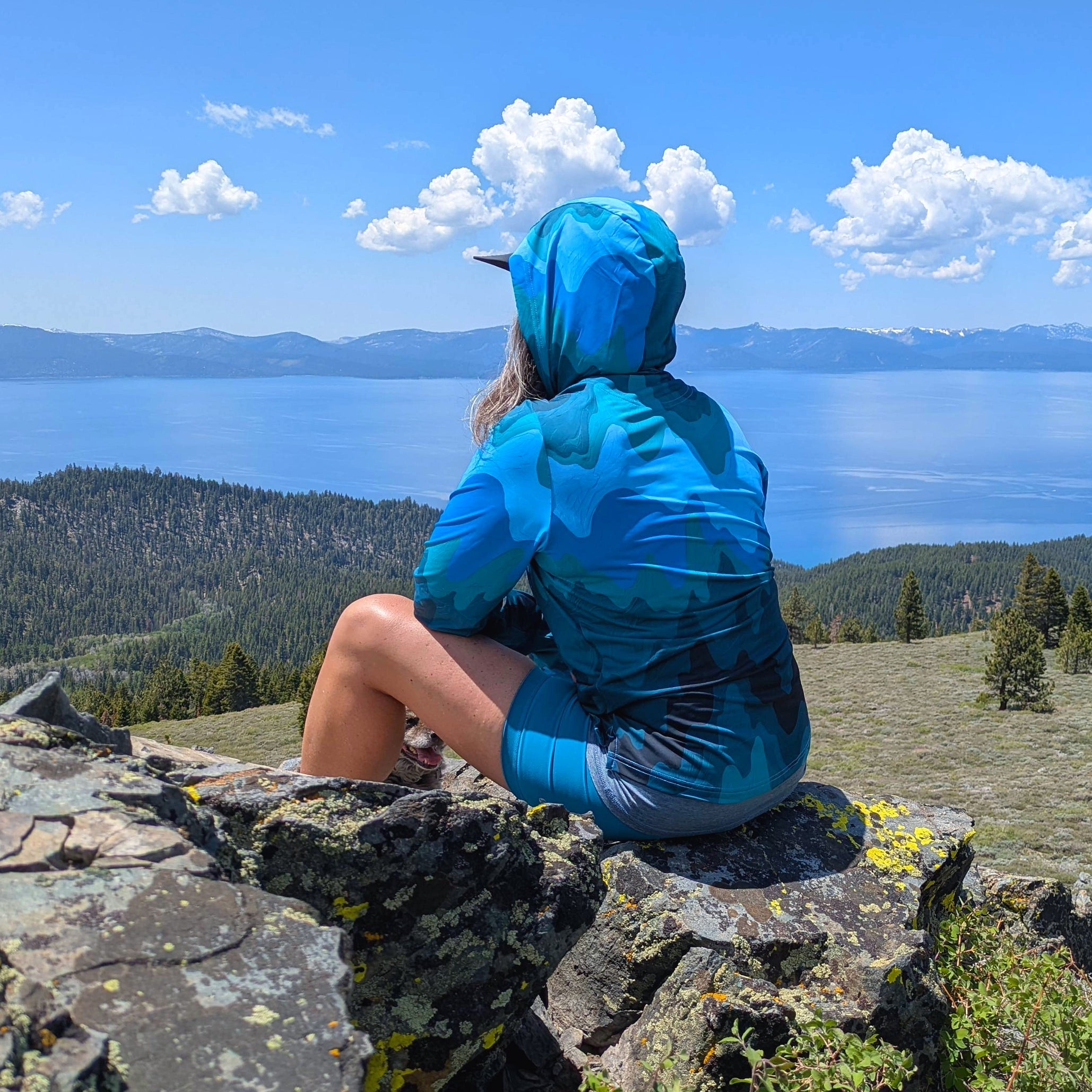 Women's Faultline395 Carson Sun Hoodie with mountain wave design, lightweight sun protection fabric, and relaxed fit.