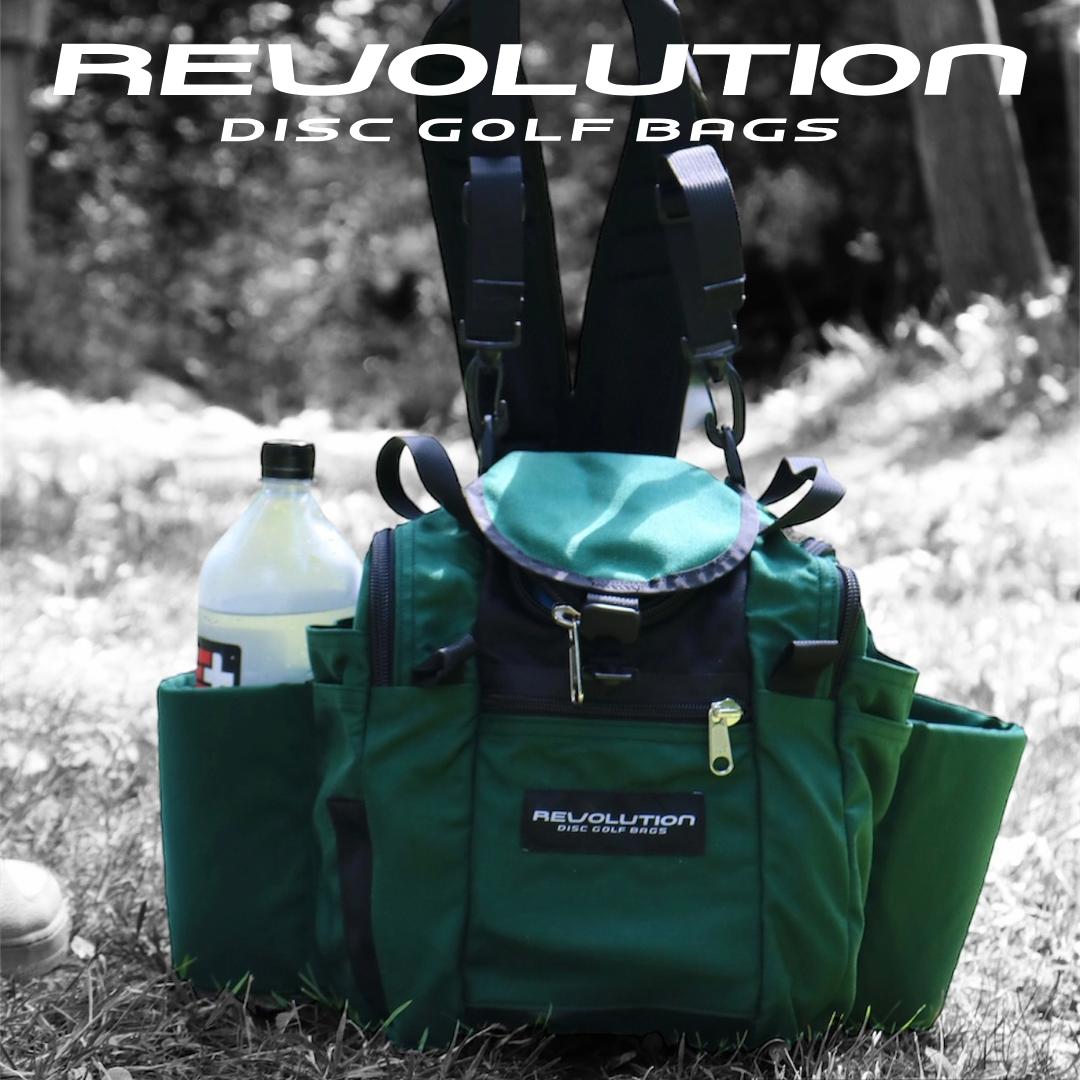 Gotta Go Gotta Throw Revolution Mini Deluxe V3 disc golf bag in forest green with multiple compartments and adjustable straps.