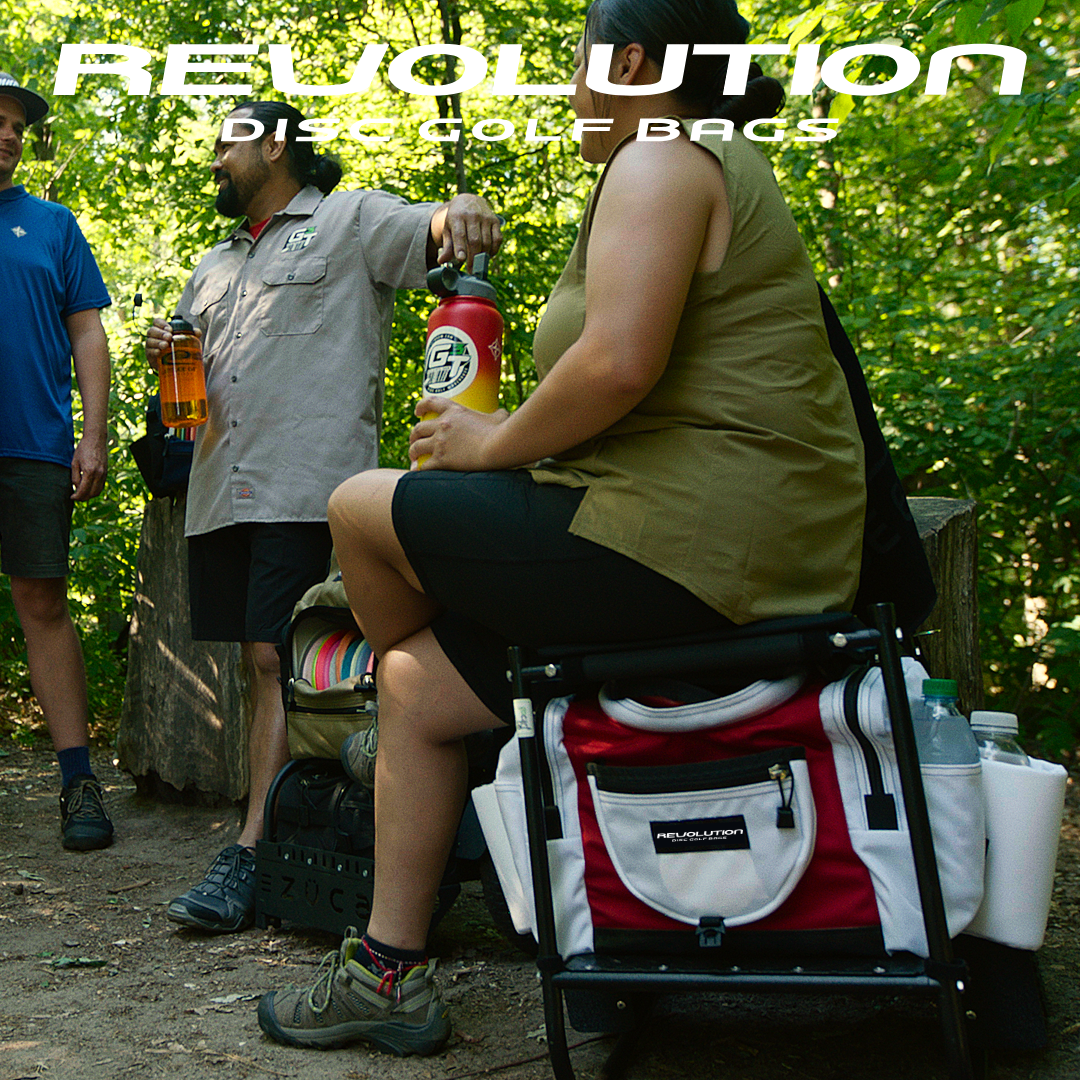 Gotta Go Gotta Throw Revolution Carolina Team V3 disc golf bag in rust color, with multiple compartments and adjustable straps.