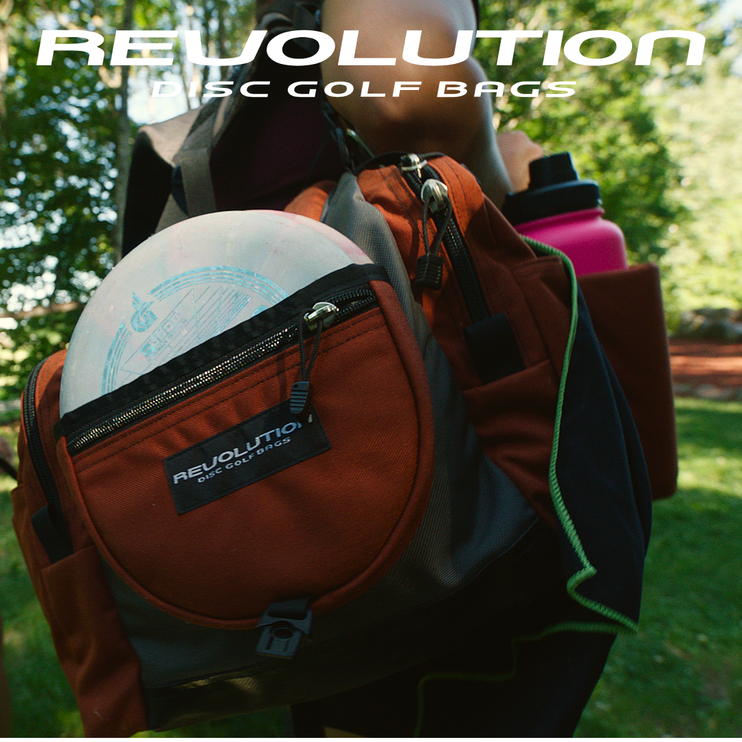 Gotta Go Gotta Throw Revolution Carolina Team V3 Disc Golf Bag in rust color with multiple compartments and adjustable straps.