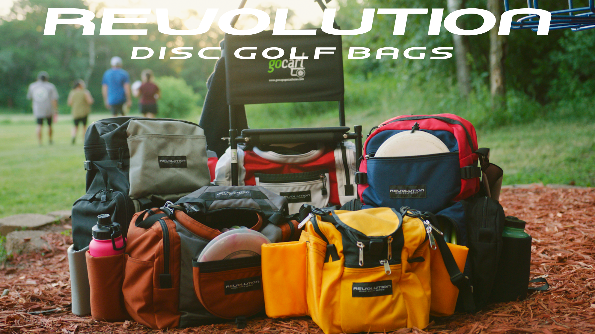 Gotta Go Gotta Throw Revolution Carolina Team V3 disc golf bag in golden yellow with multiple storage compartments.