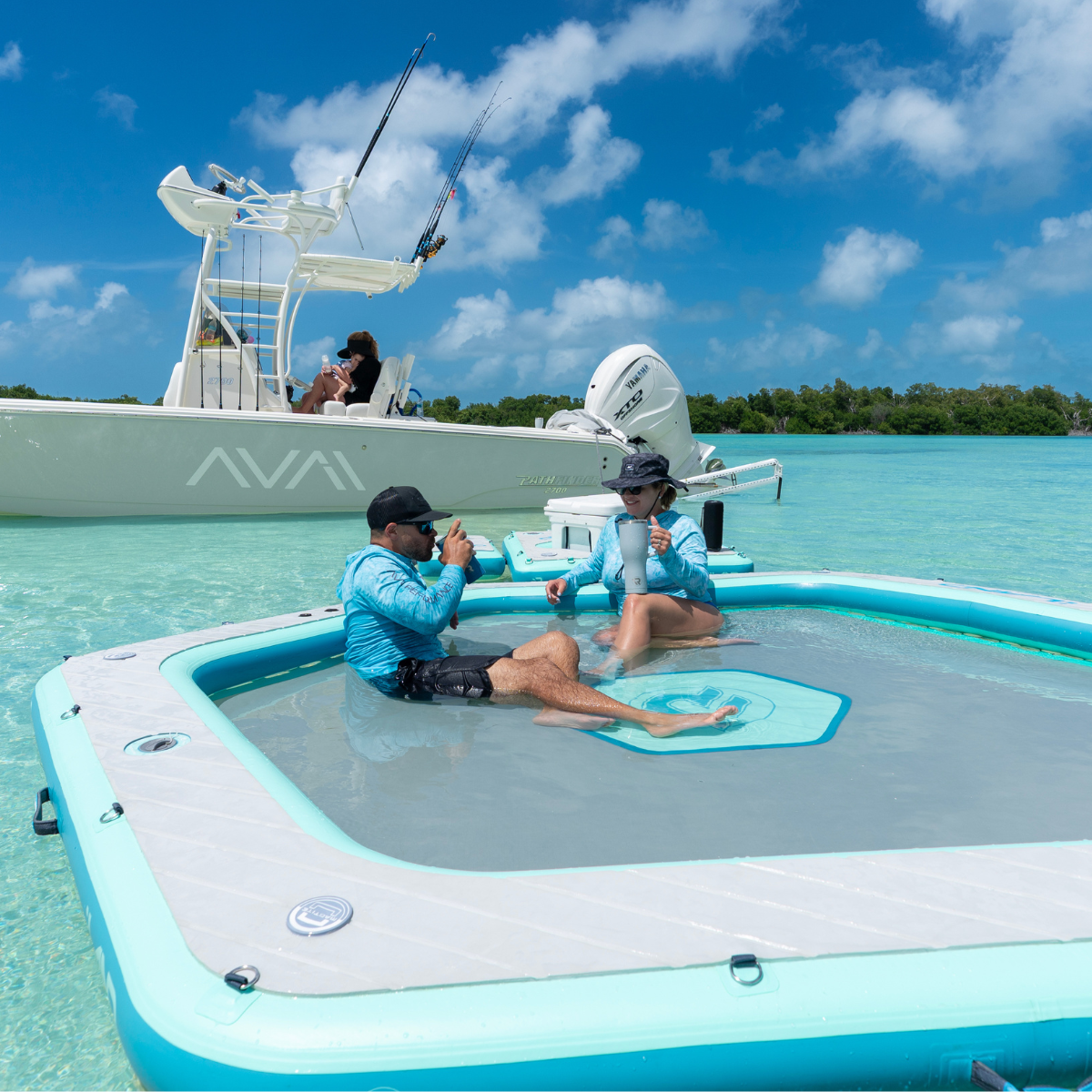 iLAND® 10' inflatable float from iROCKER US, shown in a vibrant design, ideal for relaxing on water.