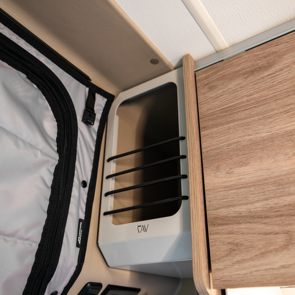 Ekko Cab Cubby made in Utah by Canyon Adventure Vans, featuring a wooden storage cubby with natural finish and handcrafted details.