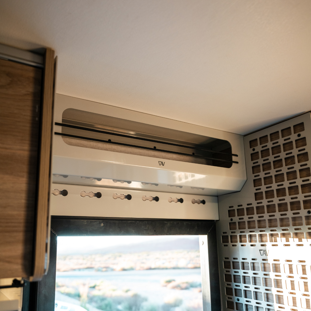 Ekko Doorway Upper Cabinet by Canyon Adventure Vans, made in Utah, featuring durable construction and spacious storage for van interiors.