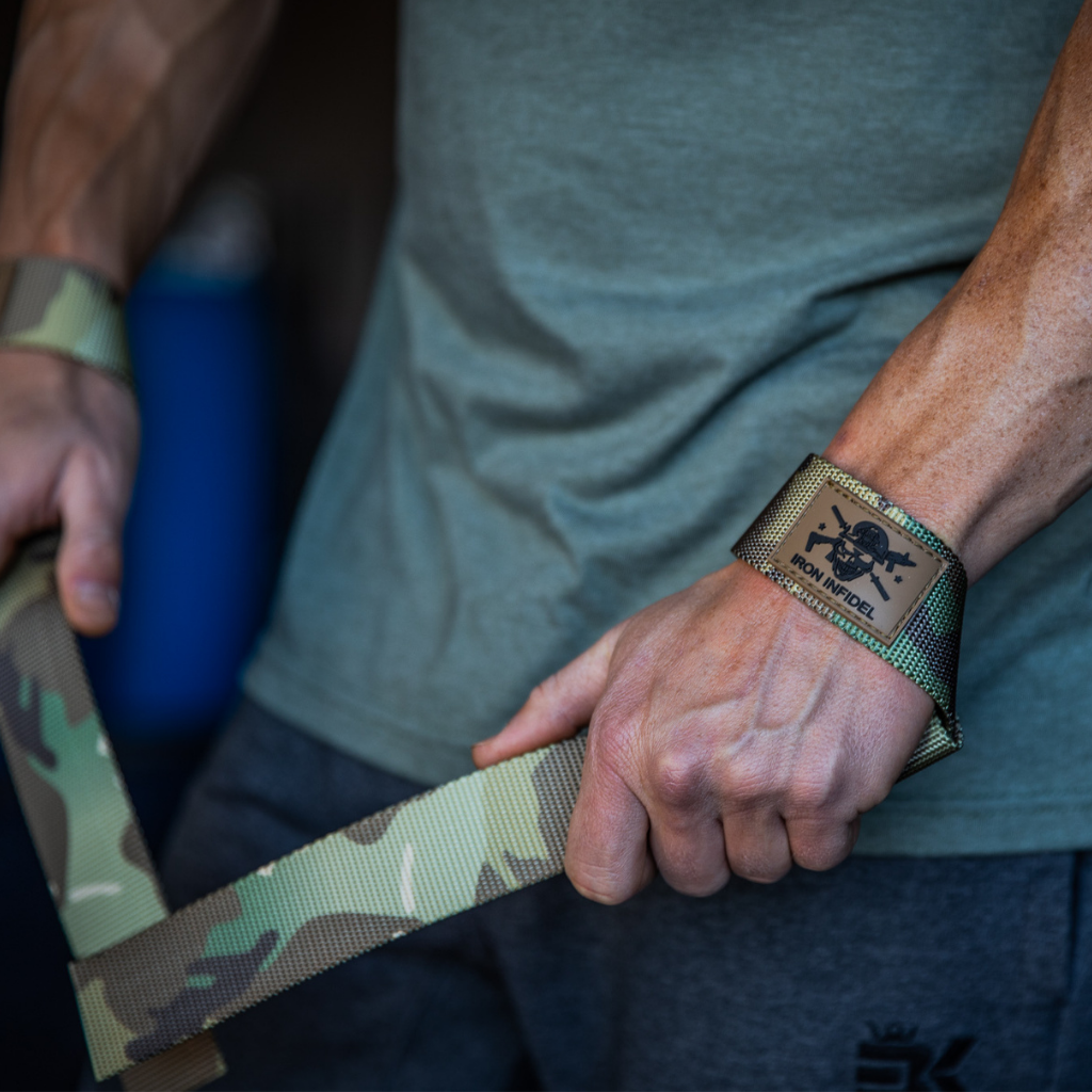 Black Iron Infidel lifting straps with padded wrist support for enhanced grip during weightlifting and strength training.