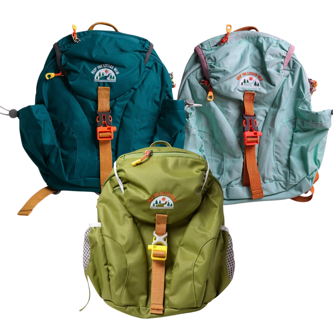 Colorful toddler hiking backpack from Keep the Littles Wild, featuring multiple vibrant colors and adjustable straps for kids.