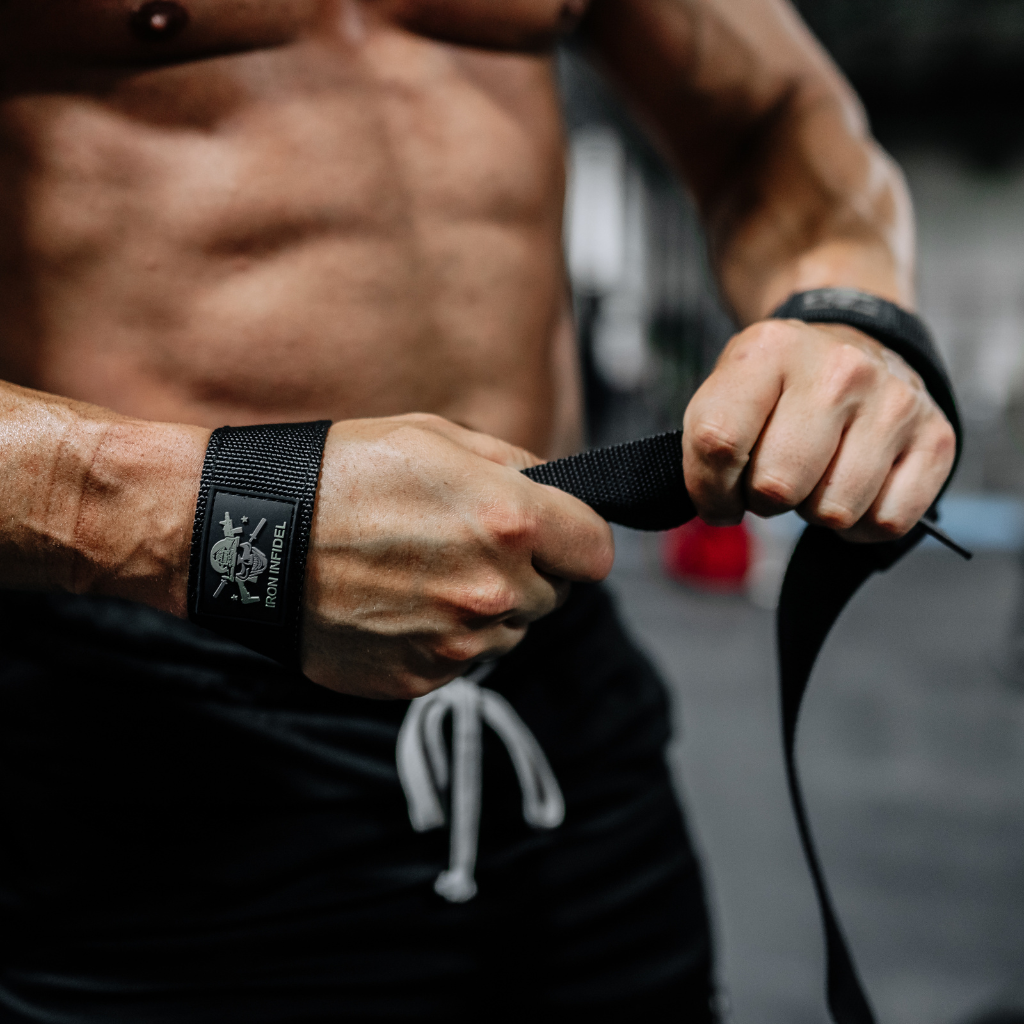 Iron Infidel lifting straps for weightlifting, showing durable nylon straps with padded wrist support and reinforced stitching.