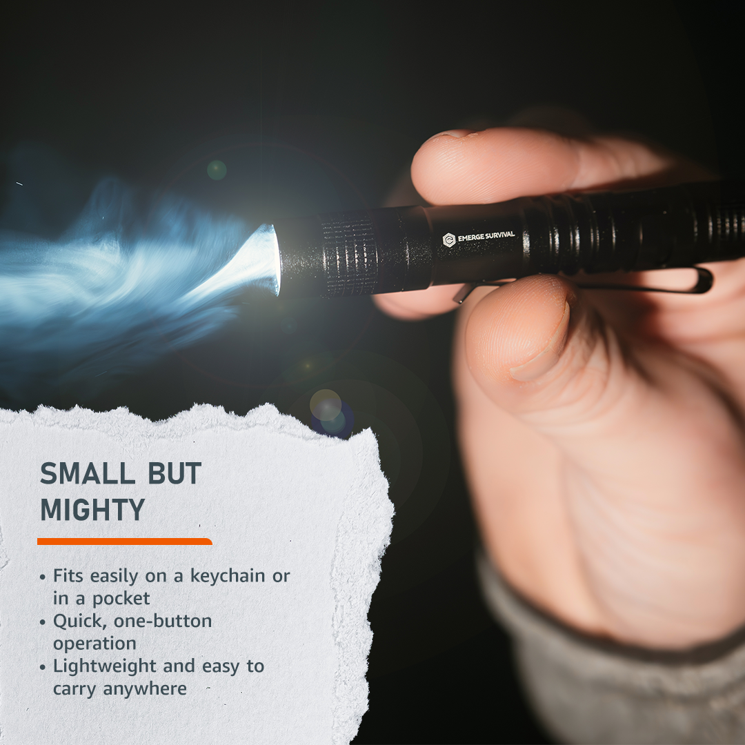 Emerge Survival EDC Mini Flashlight held in hand, compact and portable for everyday carry and outdoor use.