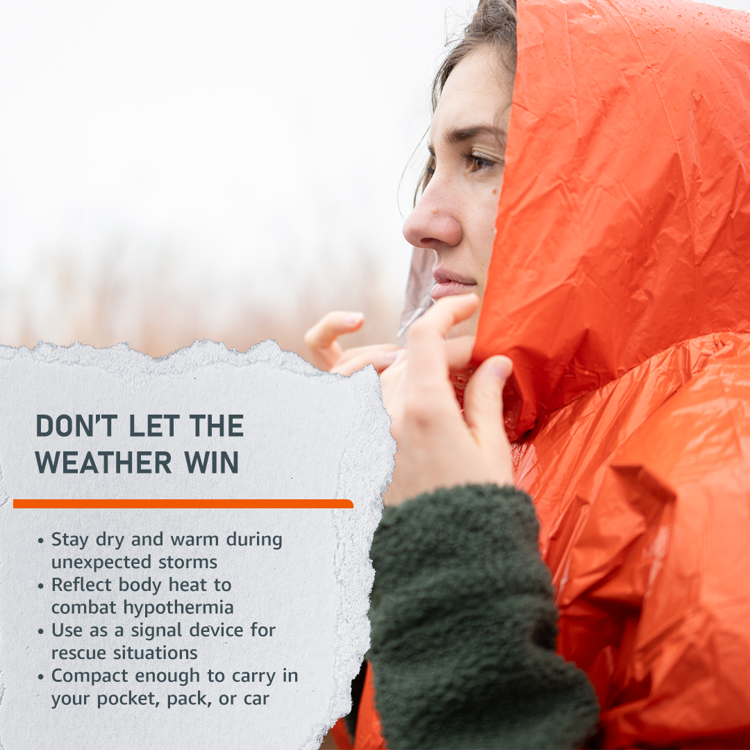 Emerge Survival Mylar Poncho spread open, lightweight reflective emergency rain and wind protection for outdoor survival situations.