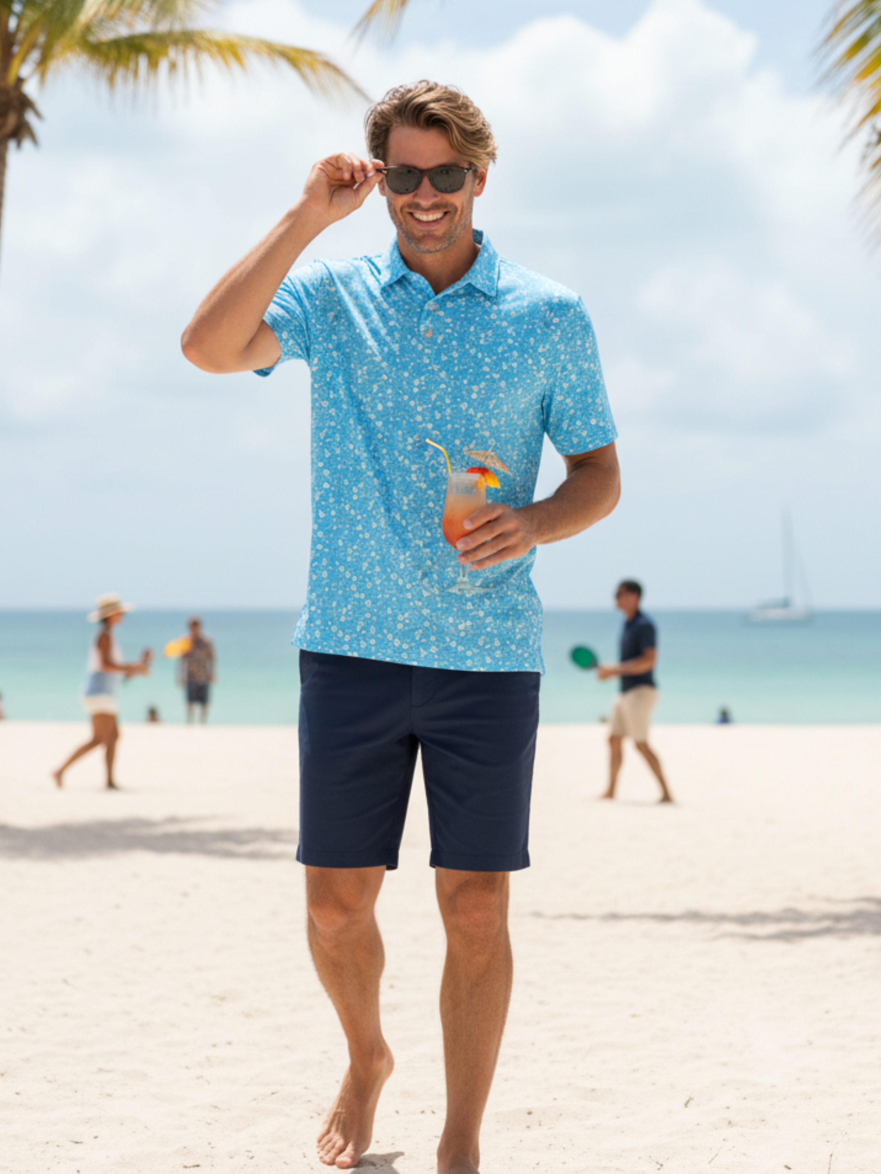 White Water Life Vacation Polo in navy, paired with casual shorts, showcasing a stylish men's polo shirt for summer outings.