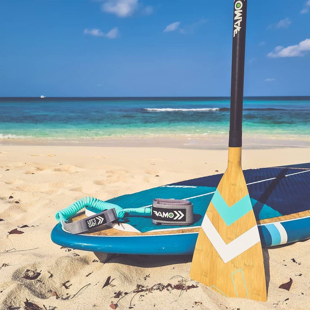 Vamo Life bamboo adjustable paddle with carbon-fiberglass shaft and ABS edge, ideal for stand-up paddleboarding on Caribbean waters.