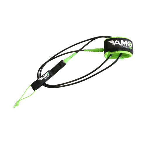 Vamo Life straight surf leash in green attached to a surfboard, designed for secure connection during surfing sessions.