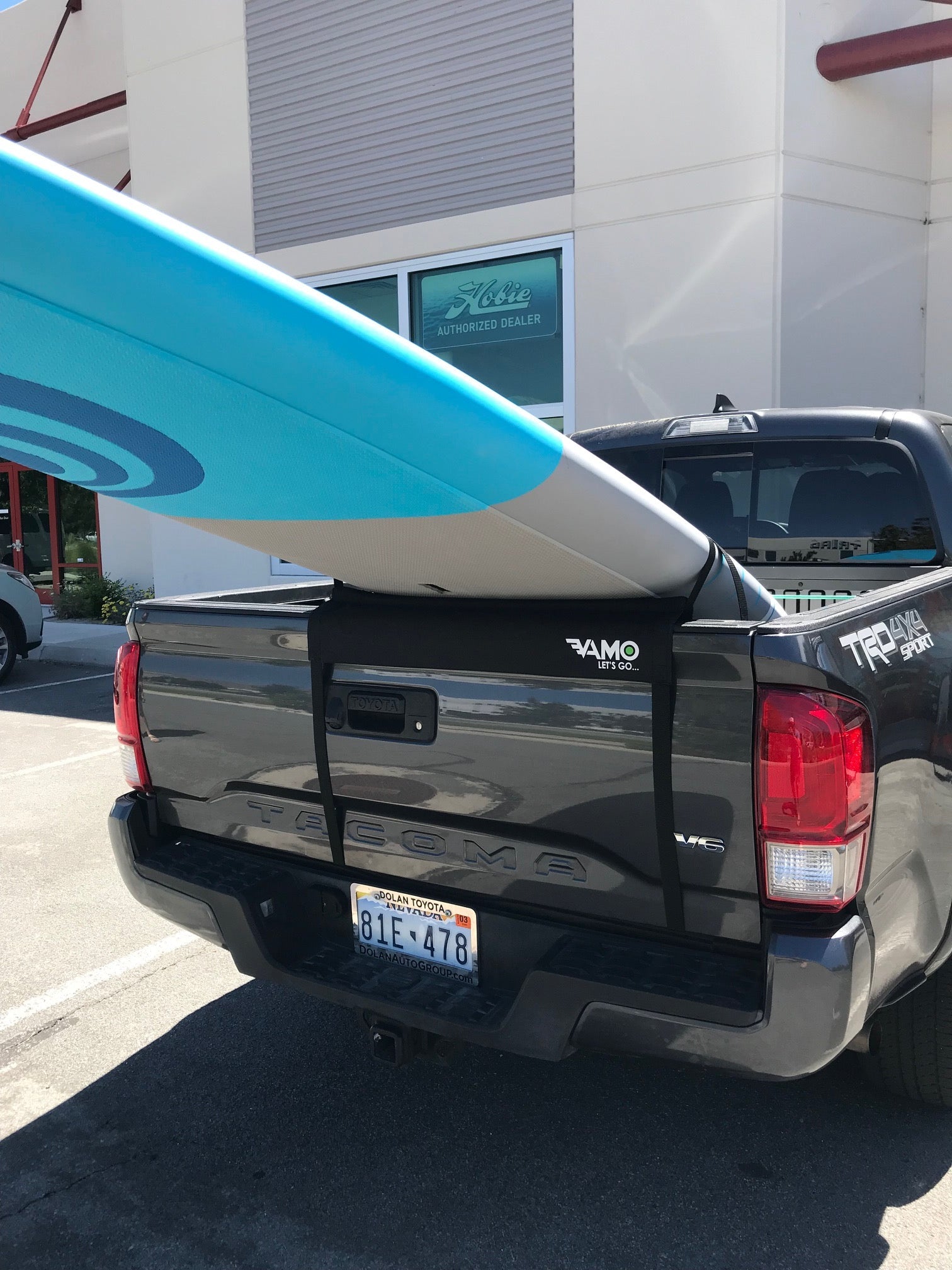 Vamo Life premium truck tailgate pad in 30-inch and 18-inch sizes, designed to protect and secure items on the tailgate.