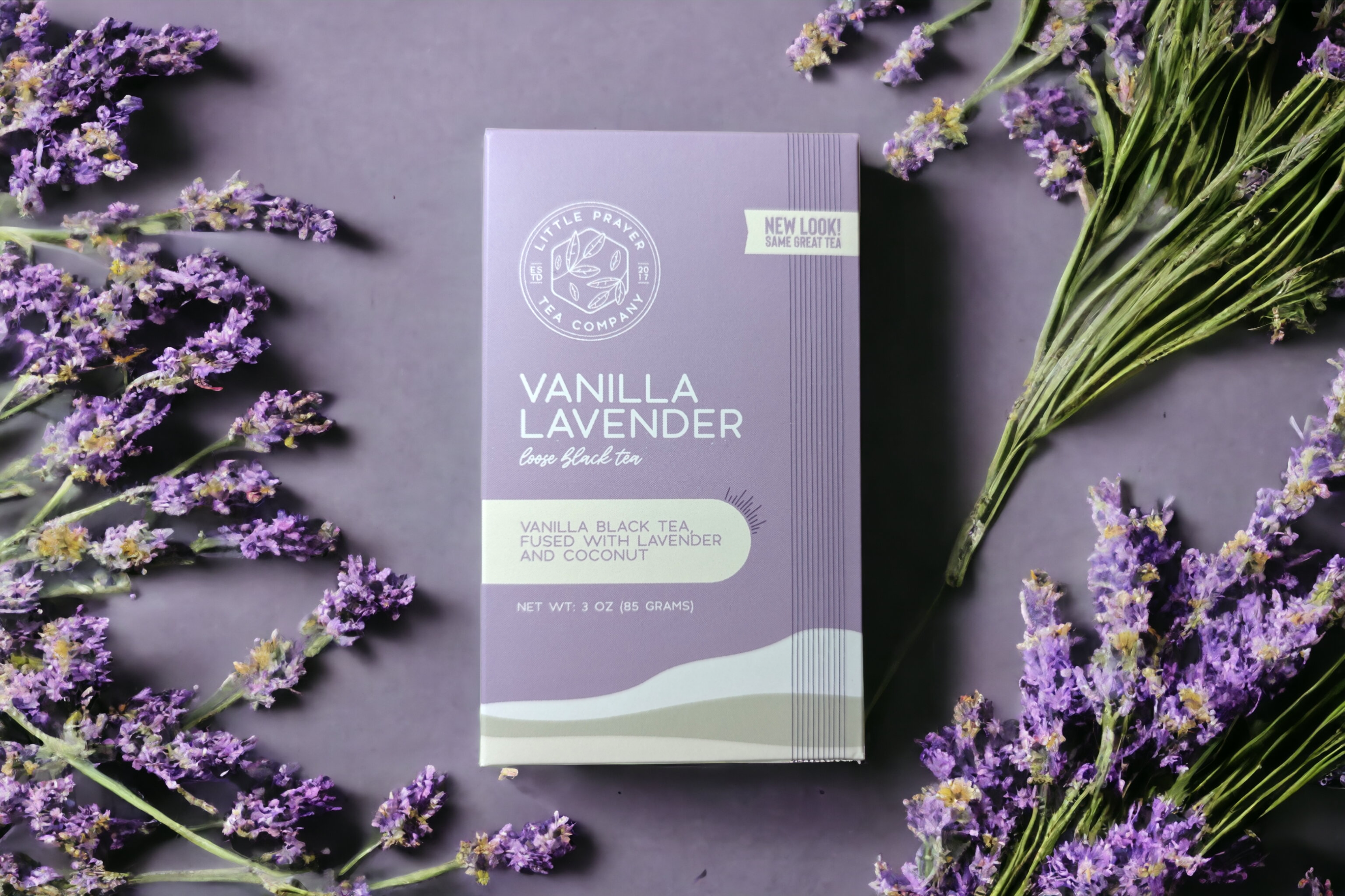 Black vanilla lavender tea from Little Prayer Tea Company, showing a close-up of the tea blend with vanilla beans and lavender flowers.