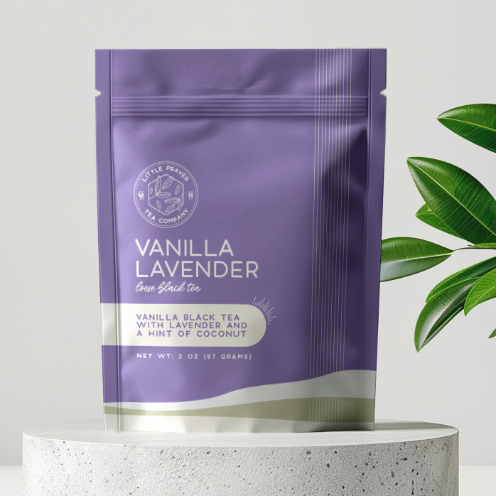 Pouch of Little Prayer Tea Company's vanilla lavender black tea with dried vanilla beans and lavender buds inside.