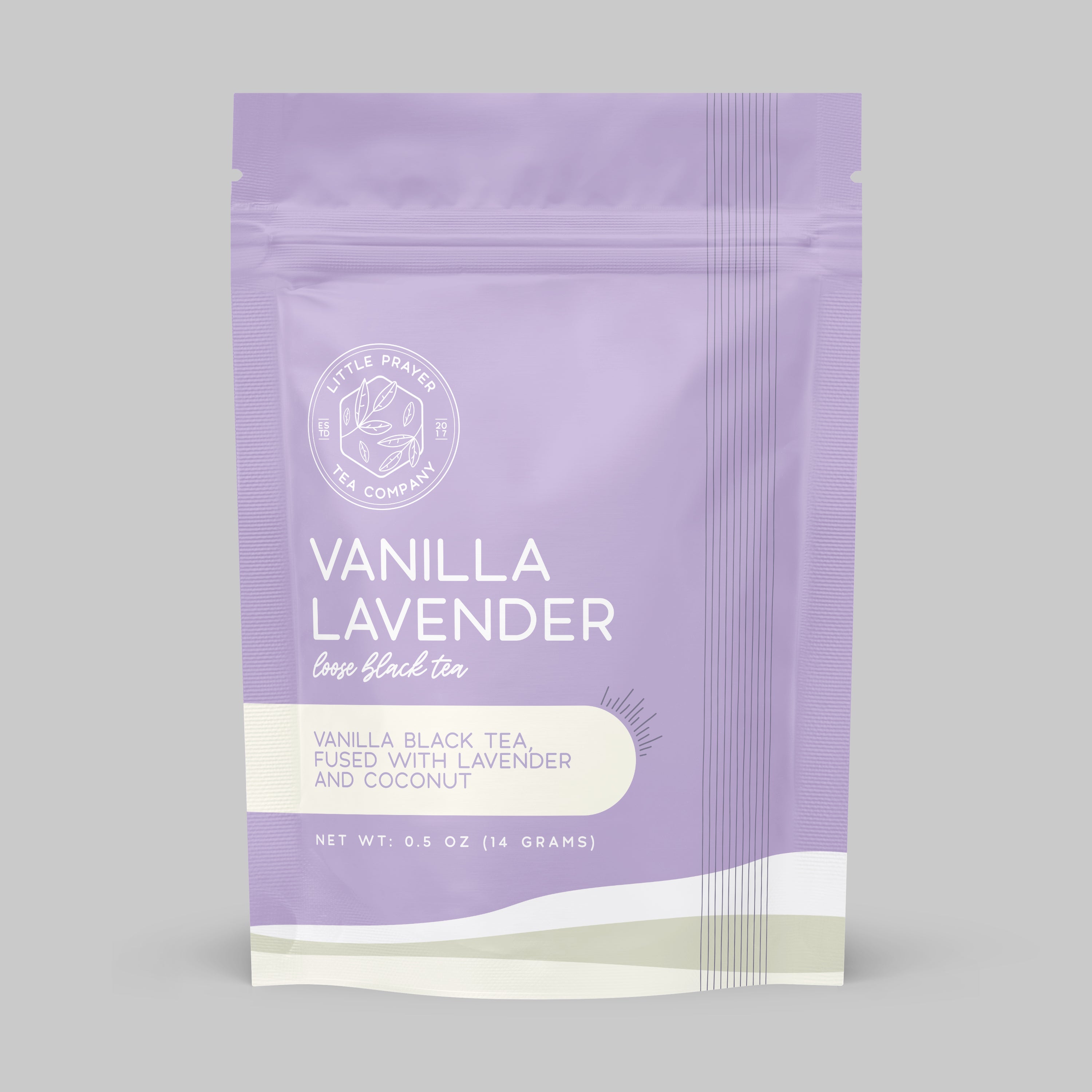 Sample of Little Prayer Tea Company's vanilla lavender black tea, showing a brewed cup with vanilla beans and lavender sprigs.