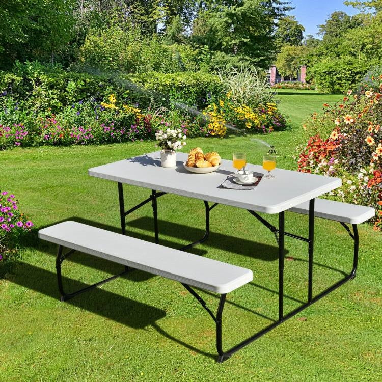 White folding HDPE picnic table with two benches, outdoor patio furniture set by HomePacific, ideal for outdoor dining and gatherings.