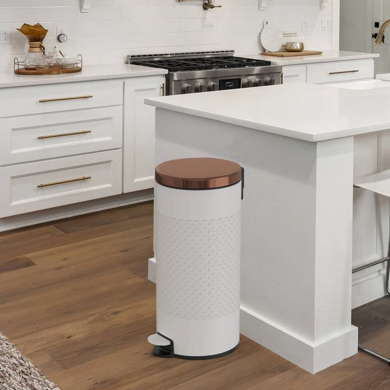 White and gold metal hands-free 8-gallon step-on trash can by HomePacific for kitchen use, with a sleek modern design.