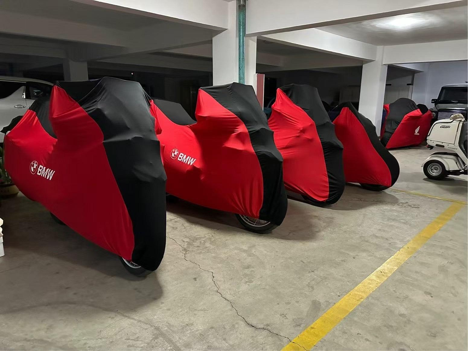 Custom made motorcycle velvet stretch dust cover by Bean's Moto Booth, shown draped over a motorcycle to protect from dust.
