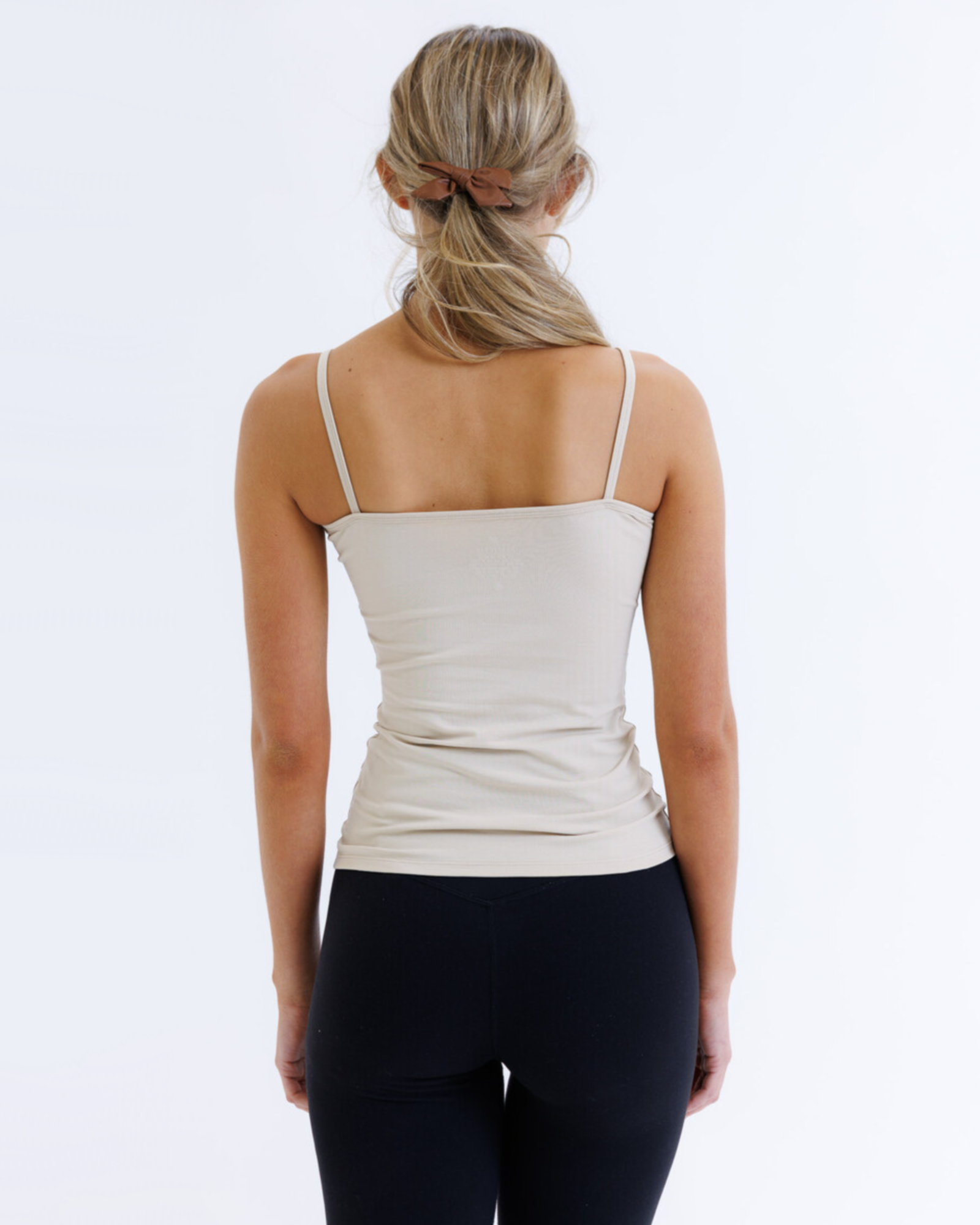 Downeast Wonder Cami in nude color, a soft, seamless women's tee made for comfort and versatile styling.