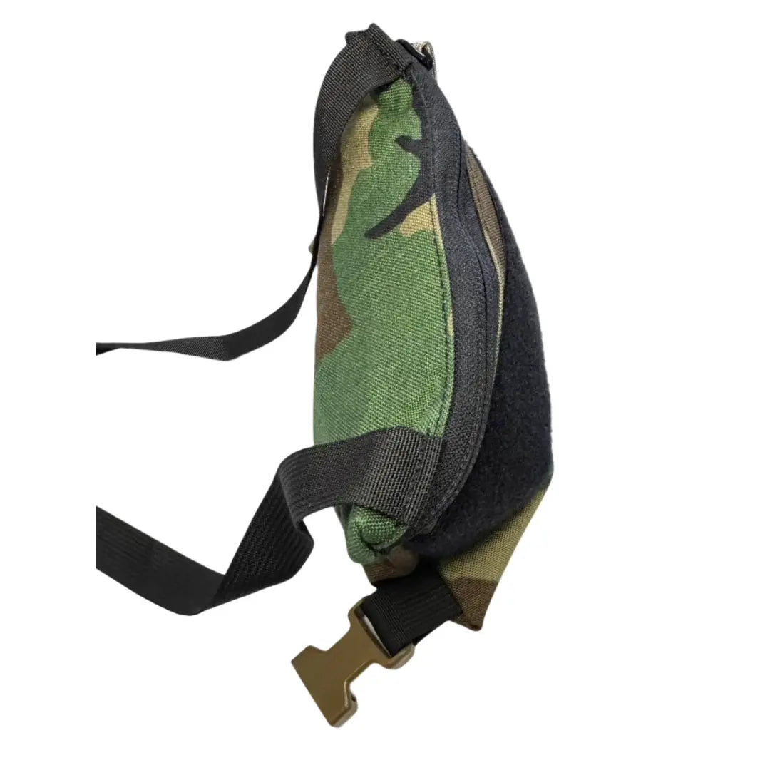 Woodland Minimalist Chest Rig by Recycled Firefighter featuring adjustable straps and multiple pockets for gear storage.