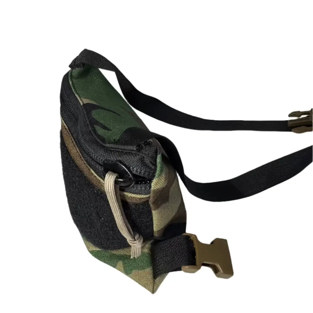 Woodland Minimalist Chest Rig by Recycled Firefighter, featuring durable fabric and adjustable straps in a camouflage pattern.