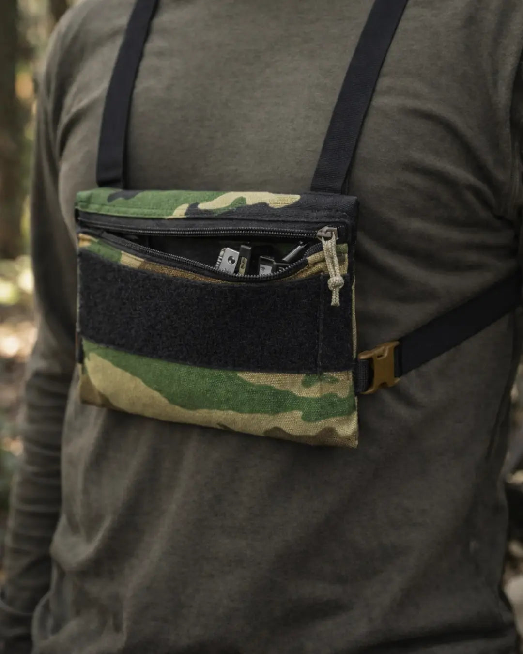 Woodland Minimalist Chest Rig by Recycled Firefighter featuring adjustable straps and multiple pockets for gear storage.