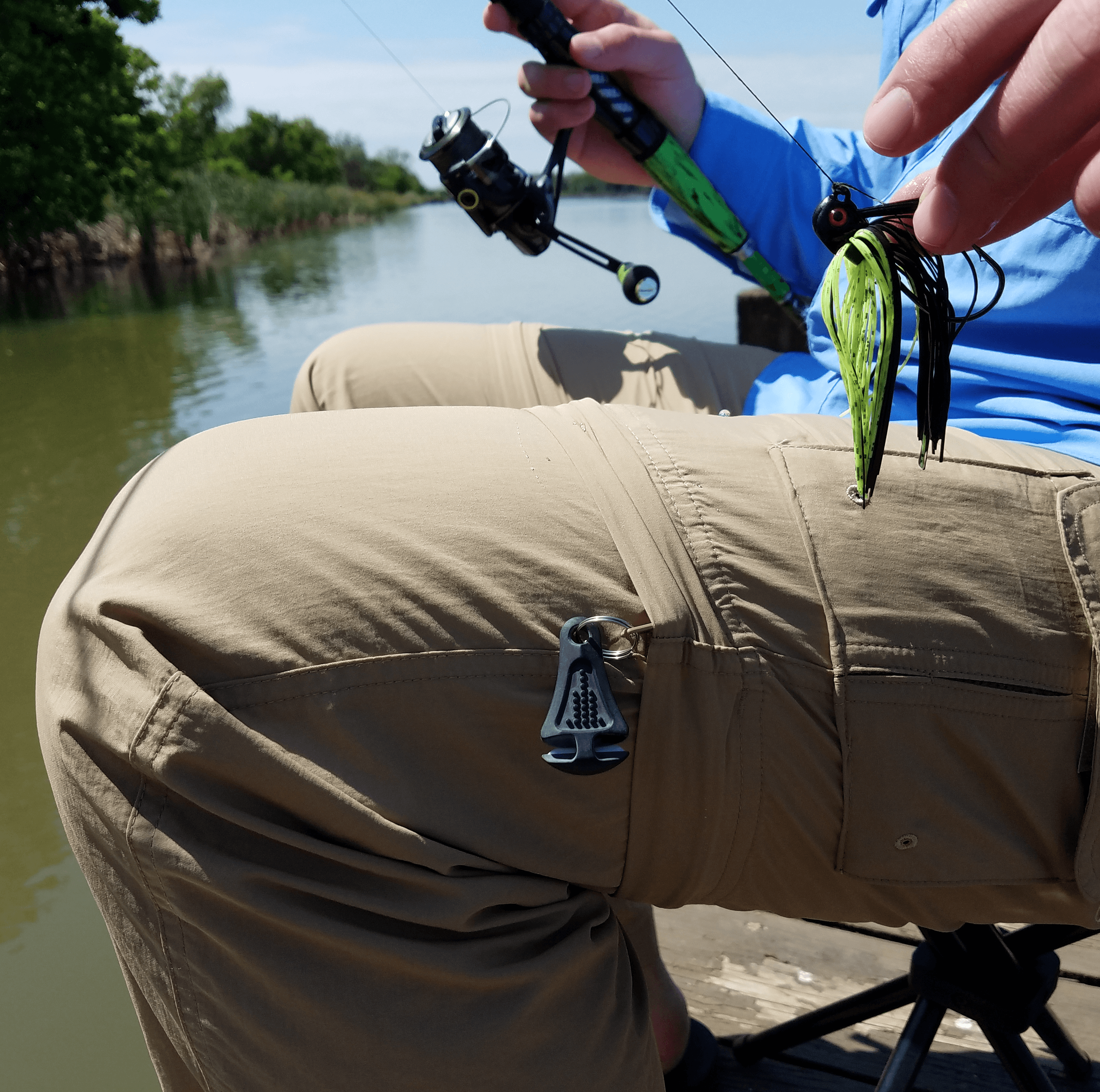 Green Line Cutterz zipper pull with ceramic blade, designed for easy attachment to bags or clothing.