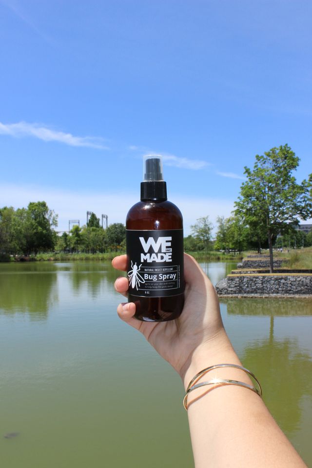 Natural bug spray by WE Made, insect repellent in a spray bottle, effective against mosquitoes and bugs outdoors.